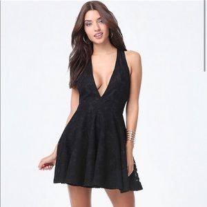 Bebe Black lace Fit and Flare Plunge neck dress size 4